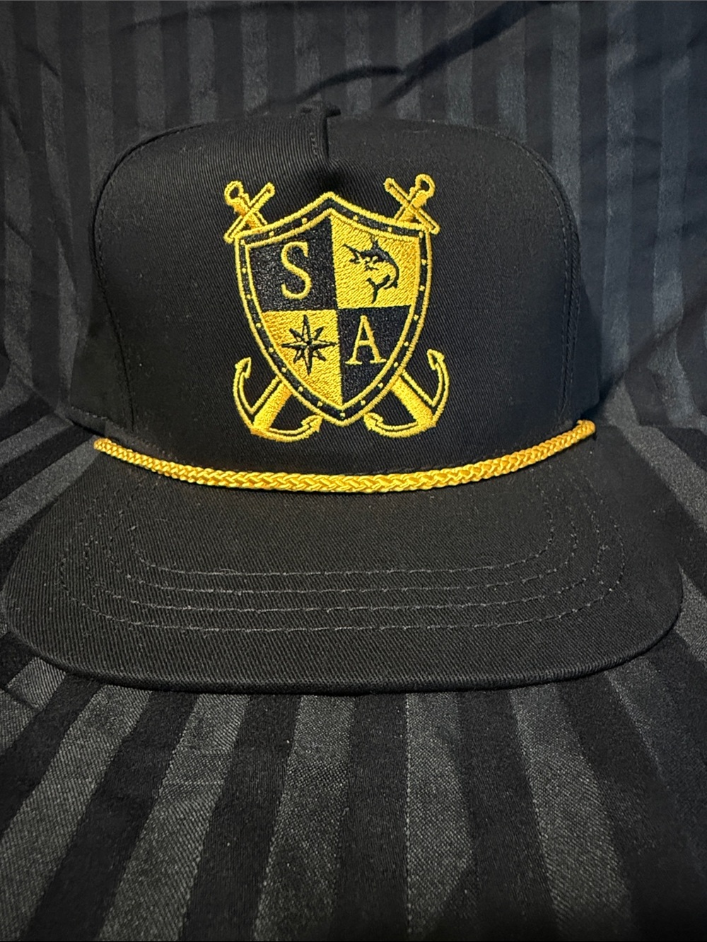 Black and Gold Embroidered Crest Rope Snapback Hat